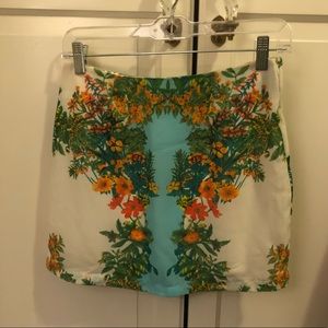 Lush white mini skirt with floral detailing